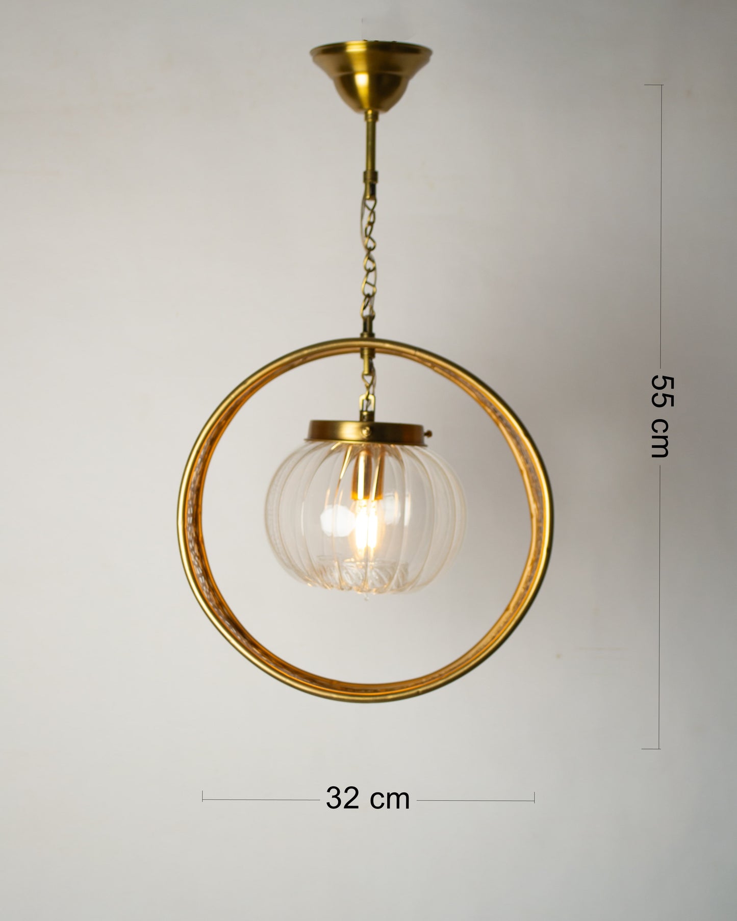 Arket disc and glass pendant
