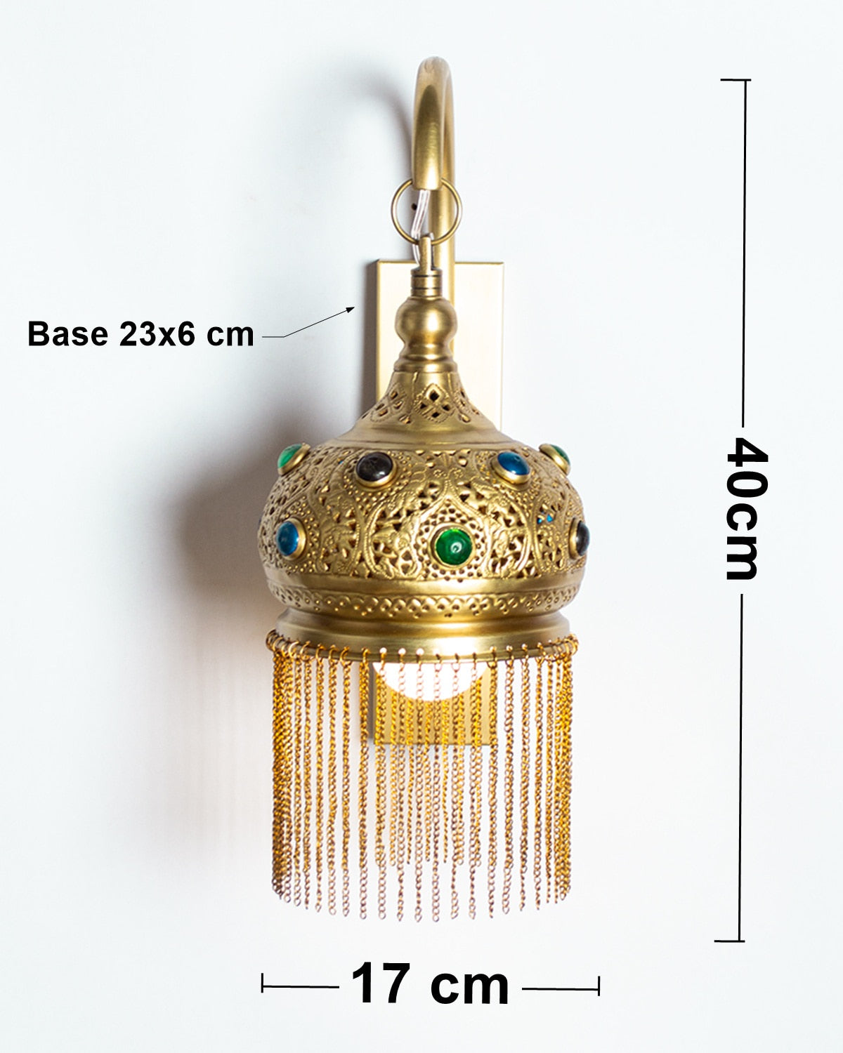 Repoussé glass inlay wall light