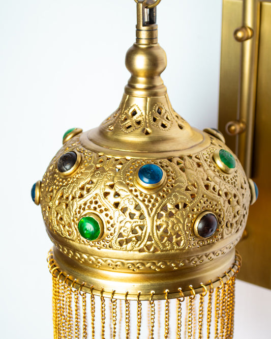 Repoussé glass inlay wall light