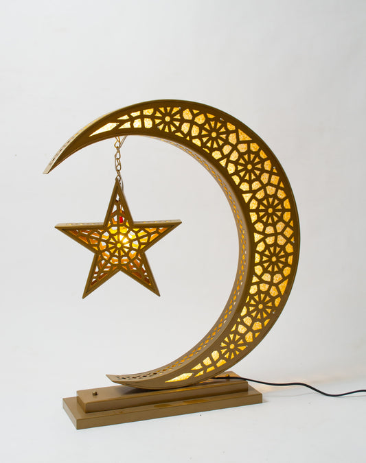 Decorative lamp with a crescent moon and star design on a white background