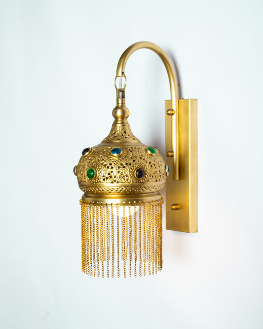 Repoussé glass inlay wall light